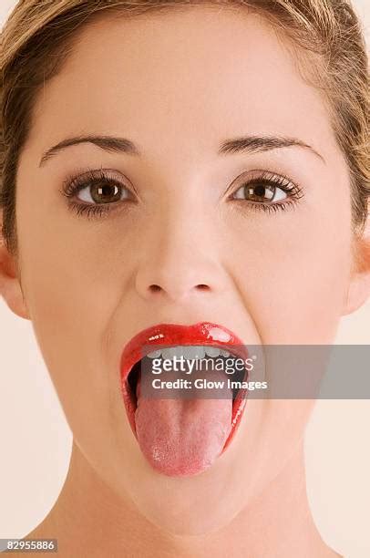 Woman Tongue Sticking Out Photos And Premium High Res Pictures Getty Images