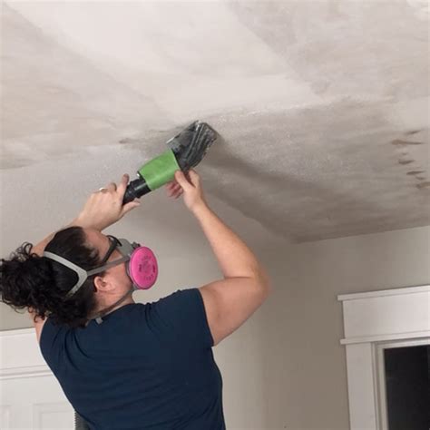 Process of removing the top surface of a material, such as wood, using sandpaper. How to Remove Popcorn Ceilings for Repainting - Wagner ...