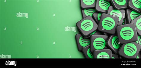 Logos Of The Music And Podcast Streaming Company Spotify On A Heap On A