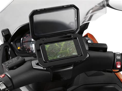 Bmw's motorrad smart phone cradle, a perfect combination of fun on two wheels and multimedia. The BMW Motorrad Smartphone Cradle Is Outrageously ...