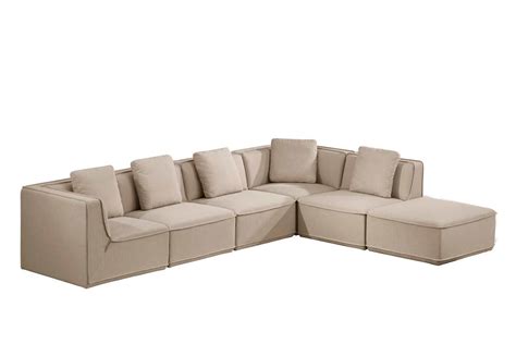Two striped pillows, elegantly sloped arms rests, and tapered legs complete the look of this comfy beige sofa. Beige Fabric Modular Sectional Sofa VG 701 | Fabric ...