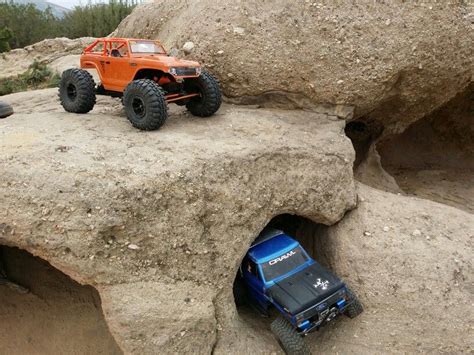 A Freind With His Axial Deadbolt And My Custom Axial Scx10 I Think He
