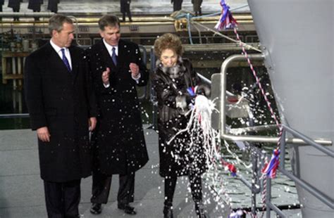 Former First Lady Nancy Reagan Smashes The Traditional Bottle Of