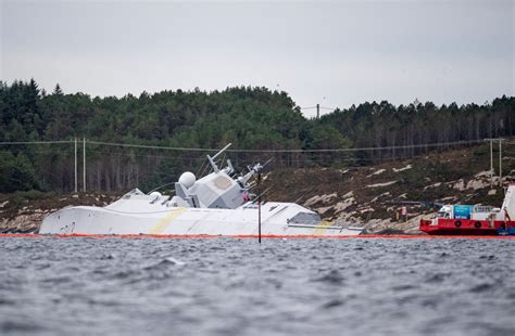 Media captionthe knm helge ingstad takes in water amid fears that it might sink. Another Navel Frigate collision. And Who owns the yacht ...