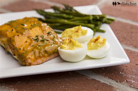 Slice the eggs in half lengthwise, removing yolks to a medium bowl, and placing the whites on a serving platter. Day 339- A surprisingly low-calorie dinner: deviled eggs, glazed salmon, and roasted asparagus ...