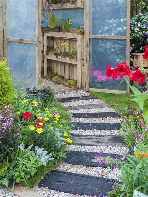 Use large landscape timbers for quick and simple garden beds. These 17 Stone Walkways are Simple to DIY | Stone walkway ...