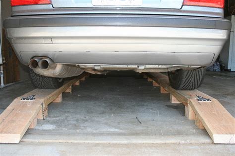 Ramps for a low car: Homemade Car Ramps. Few good size pics!
