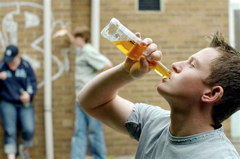 Teenage Boy Drinking Alcohol Photograph By Jim Varneyscience Photo