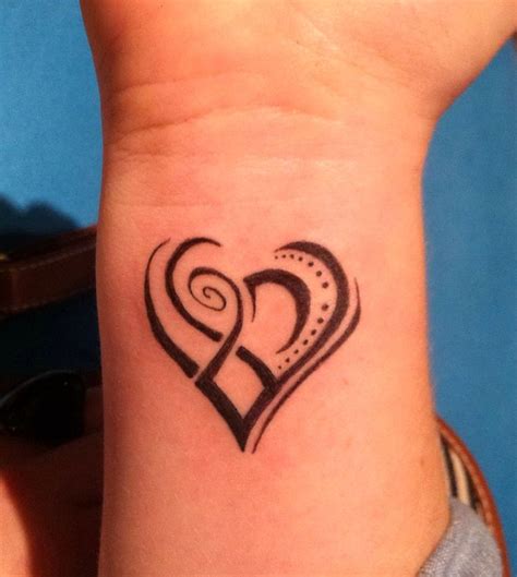 Awesome Tribal Tattoo Art Design Ideas Heart Tattoo For