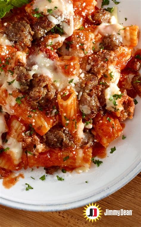 Cook sausage, onions, and bell pepper together in a large skillet. Recipes Nataliy: Jenny's Cheesy Stuffed Sausage Pasta Bake
