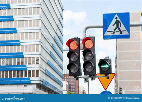 Traffic Lights And Pedestrian Crossing Road Sign In City Stock Image