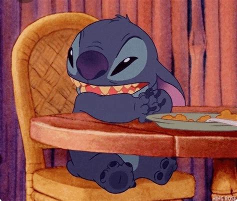 A Cartoon Character Sitting At A Table Eating Food