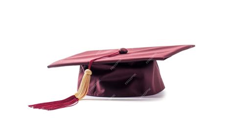 Premium Ai Image A Maroon Graduation Cap With A Red Tassel On It