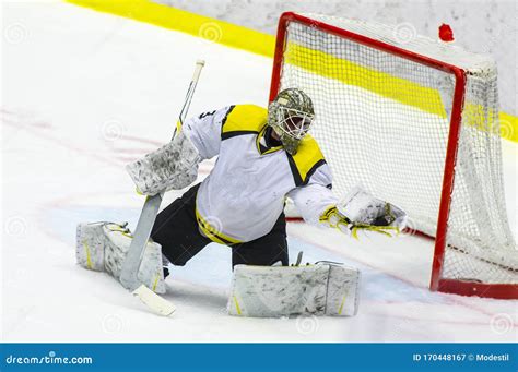 Ice Hockey Goalie Makes A Glove Save Stock Image Image Of Goal