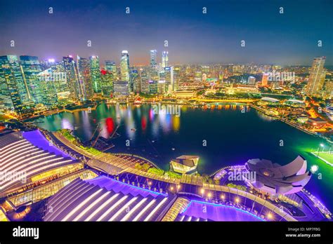 Aerial View Of Singapore Marina Bay With Financial District Skyscrapers