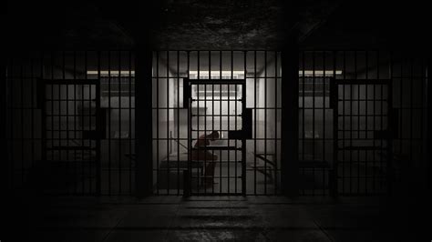Guilty Prisoner Sitting In Old Dark Prison Cell Stock Footage Ad