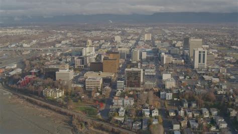 4k Aerial Video Flying By Downtown Buildings Downtown Anchorage