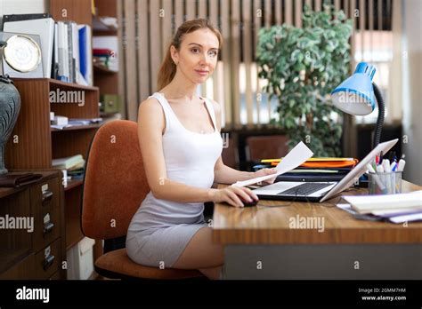 Female Secretary Doing Paperwork In Office Stock Photo Alamy