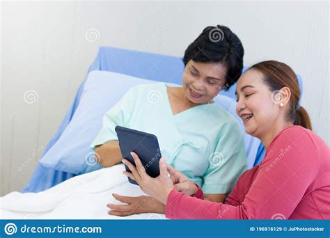 Daughter Visiting Her Elderly Mom In The Hospital Stock Image Image