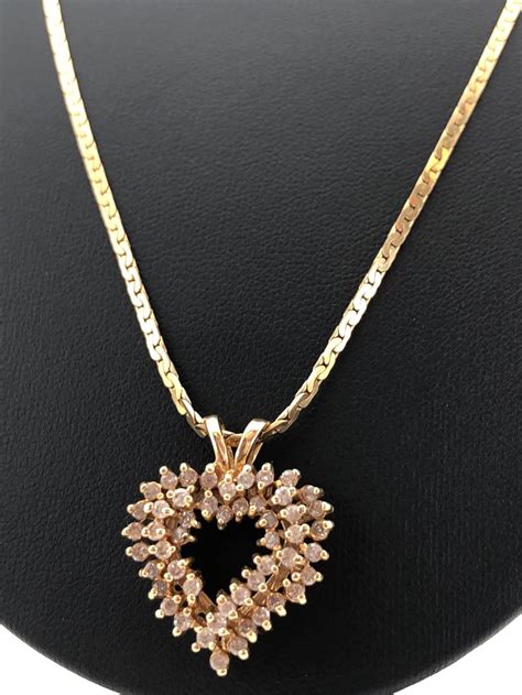 Lot 14k Yellow Gold And Diamond Heart Pendant Necklace