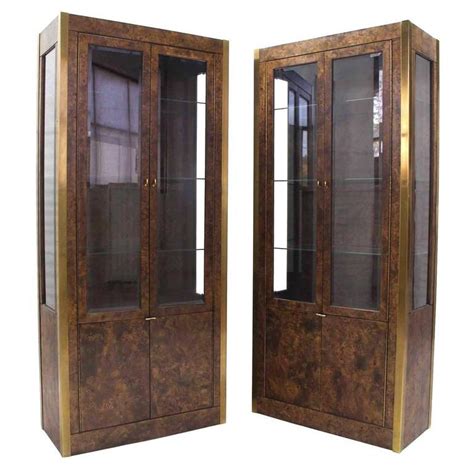 Browse our discount curio cabinets collections to satisfy the comfort level of you and the family. Pair of Burl Wood, Brass and Glass Showcase Curio Cabinets ...