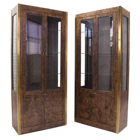 A wide variety of used curio cabinets options are available to you, such as general use, material, and appearance. Pair of Burl Wood, Brass and Glass Showcase Curio Cabinets ...
