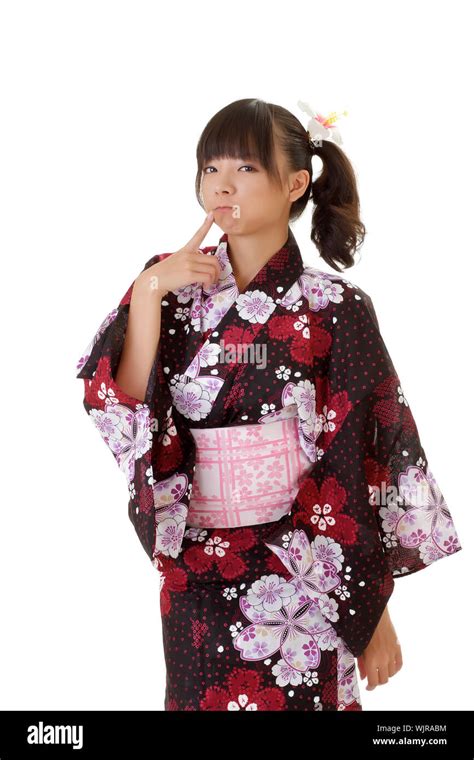 Adorable Japanese Girl With Funny Expression In Traditional Clothes