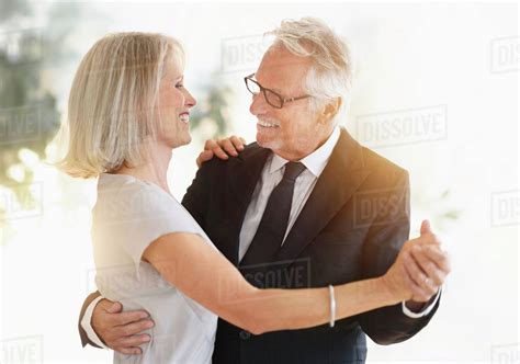 Smiling Older Caucasian Couple Dancing Stock Photo Dissolve