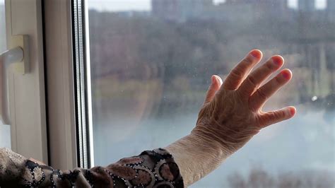 Lonely Old Woman Looking Out The Window Loneliness In Old Age Stock