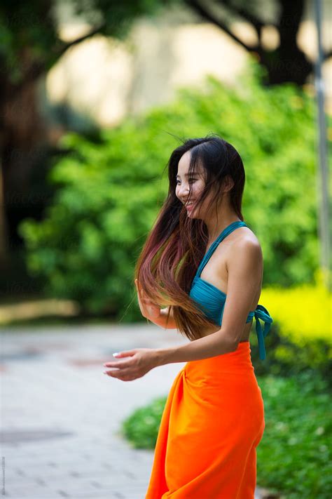 Pretty Young Asian Woman Wearing Bikini In The Garden By Bo Bo