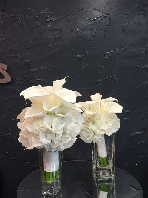 White wedding bouquet White calla Lily's and white hydrangeas | White wedding bouquets, White 
