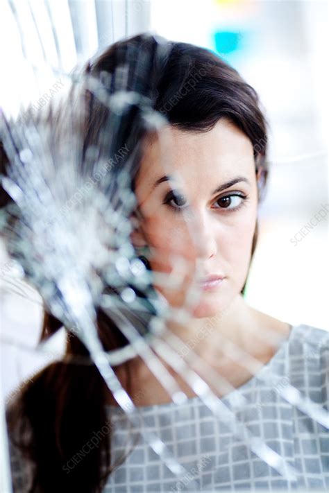 Woman In Front Of A Broken Mirror Stock Image C032 7169 Science