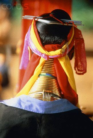 Kayan women are noted for their long necks with brass neck rings. Burma/Myanmar | Back view of a Padaung woman wearing neck rings | © Sergio Pitamitz/Corbis (With ...