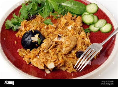 An Authentic Saudi Chicken Kabsa Known In Qatar As Majbous Garnished