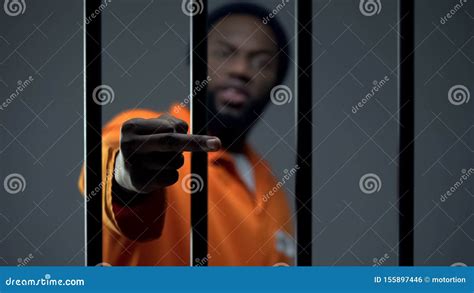 Aggressive Black Prisoner Showing Medium Finger Dangerous Criminal