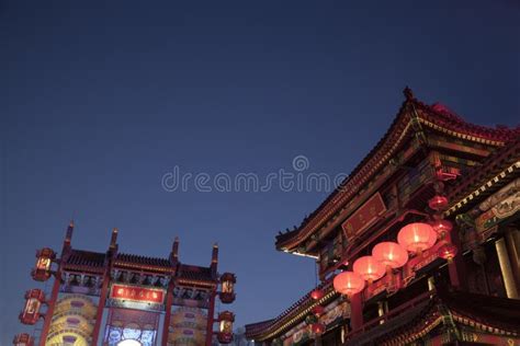 Traditional Chinese Buildings Illuminated At Night In Beijing China