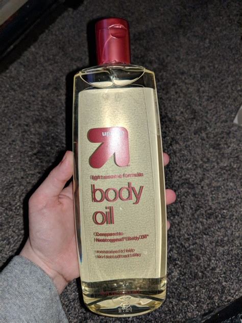 this bought it at target today has the exact ingredients as the neutrogena body oil but half