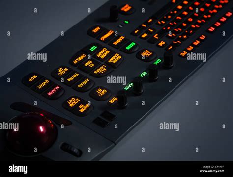 Fragment Of Colorful Illuminated Industrial Control Panel Keyboard In