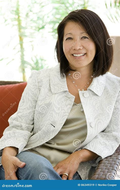 Beautiful Mature Confident Asian Woman Smiling Stock Image Image Of Confident Business