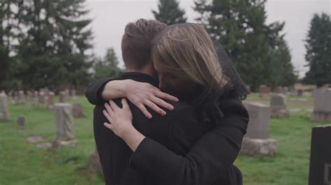Grieving Couple at Cemetery - FILMPAC