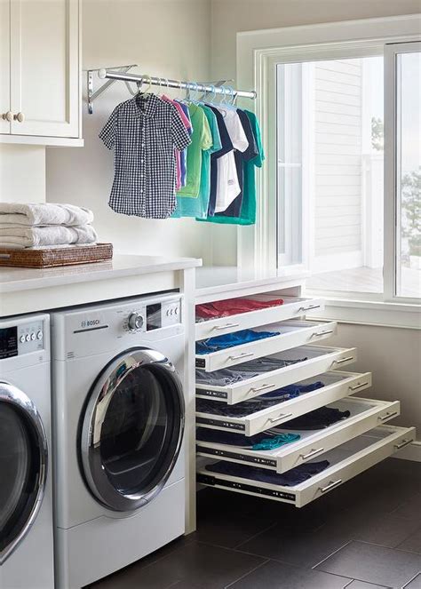 Stacked Pull Out Drying Racks In Laundry Room Transitional Laundry