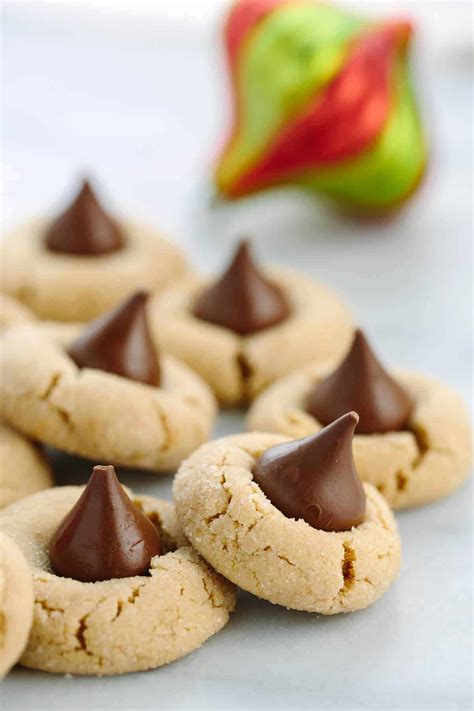 Peanut butter kiss cookies are soft cookies made of peanut butter and topped with chocolate kiss candy at the center. Classic Peanut Butter Kiss Cookies Recipe | Jessica Gavin