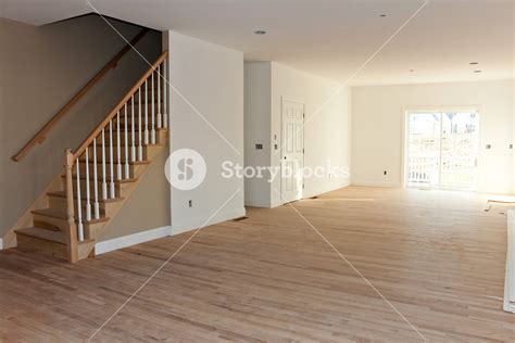 New Home Construction Interior Room With Unfinished Wood Floors