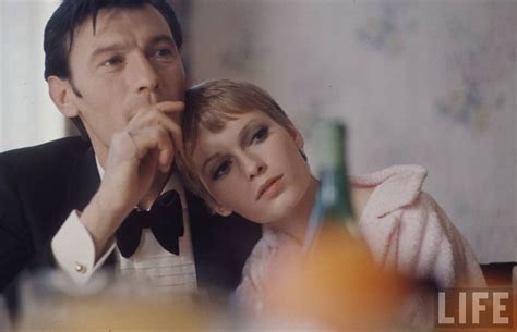 laurence harvey and mia farrow on the set of a dandy in aspic by anthony mann 1968 photo by