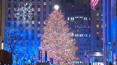 A great community event, a time to gather together and celebrate the. Rockefeller Center Christmas Tree lighting ceremony held ...