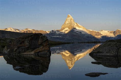Matterhorn Mountain With Reflection On Lake Stellisee At Sunrise