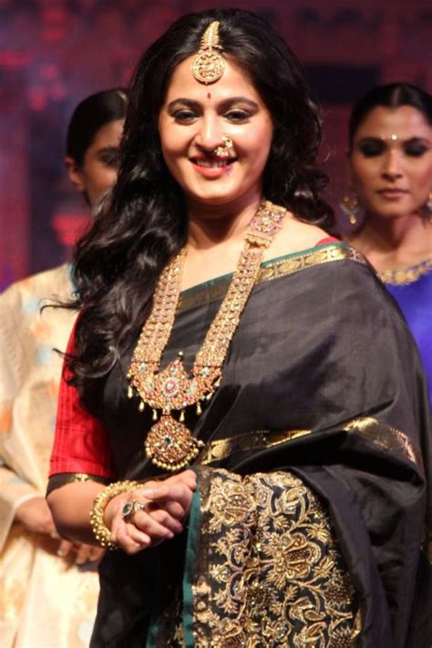 Indian Actress Anushka Shetty Stills At Fashion Show In Black Saree