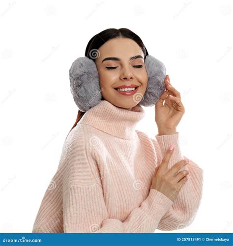 Beautiful Young Woman Wearing Earmuffs On White Background Stock Image