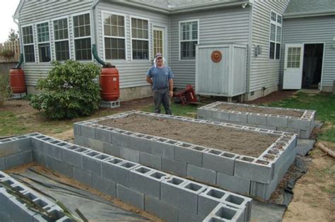 Easy to get vegetables or flowers to grow inside the. Raised beds - a beginner's attempt | Cinder block garden ...