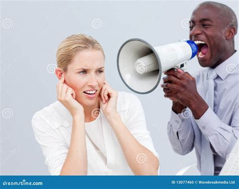 Angry Businessman Yelling Through A Megaphone Stock Photo Image Of
